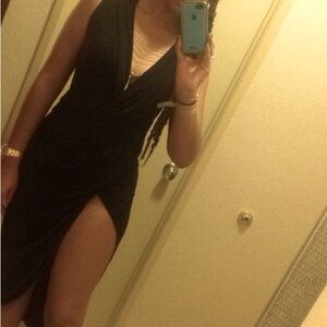 Like New - Worn Once - Black wrap waist hi split dress. Polyester